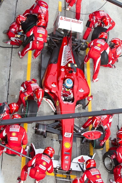 1097925-alonso-pitting-for-tires-at-the-malaysian-formula-1